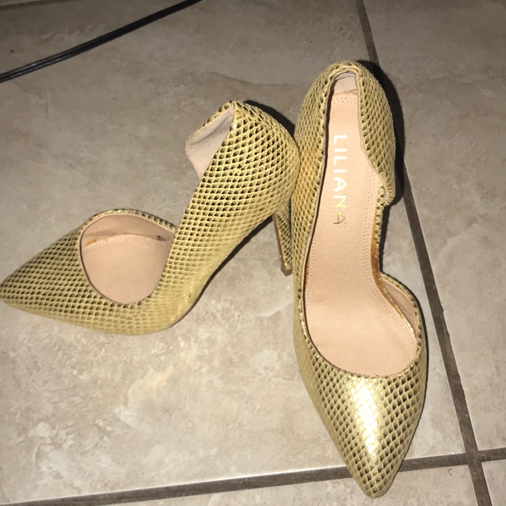 Gold pointed heels